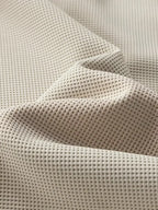 “ALTHORA™ Modern Layer Pullover — black pullover with built-in white layer and modern V-neck.”