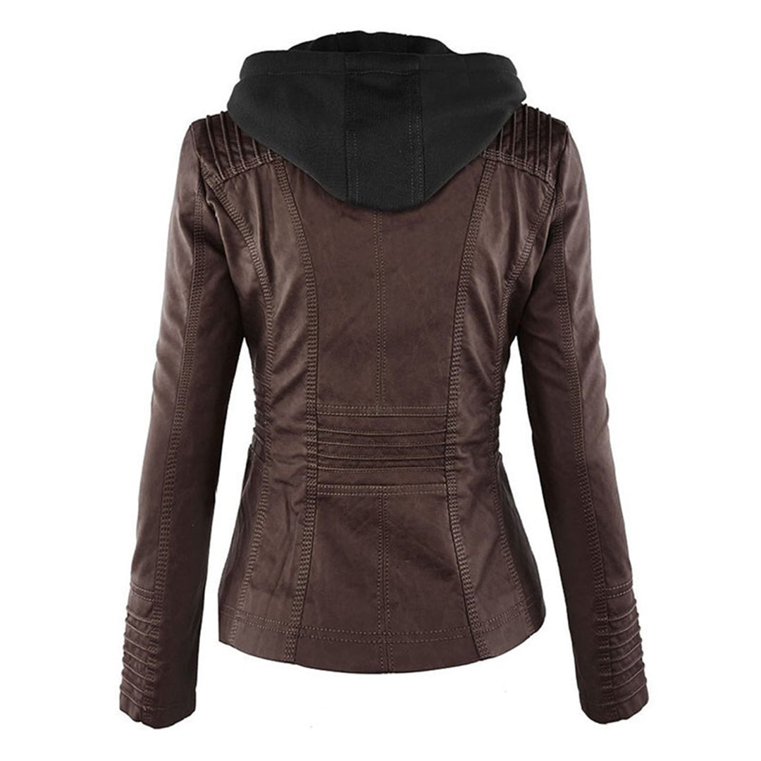 Studio shot of a women's fitted faux leather biker jacket in a warm cognac/light brown colour. The jacket has a front zipper closure, zippered chest and side pockets, detailed quilted shoulder and cuff panels, and an integrated fabric hood with drawstrings. The fit is clearly tailored and slim. Focus on the fitted silhouette and the texture of the faux leather.