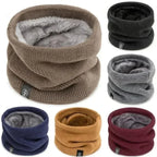 Collage of multiple colours of the ALTHORA fleece-lined thermal neck gaiter/snood. The exterior is a textured rib knit, and the interior lining is visible as a soft, grey fleece/sherpa material. Colours shown include brown, black, navy, grey, mustard, and burgundy. Focus on the plush texture and the variety of colours.