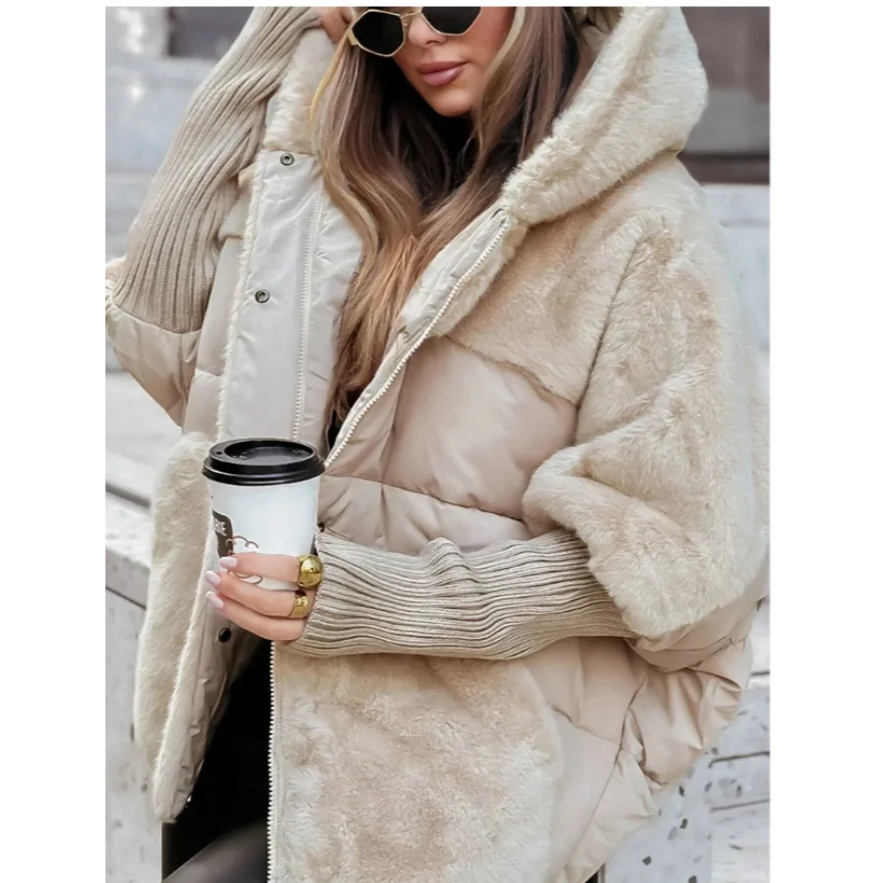 Model wearing Althora Urban Allure Coat in black — plush, oversized winter jacket with fur detailing.