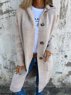 Althora Valentina Knit – beige long cardigan with buttons, styled with jeans and white tee